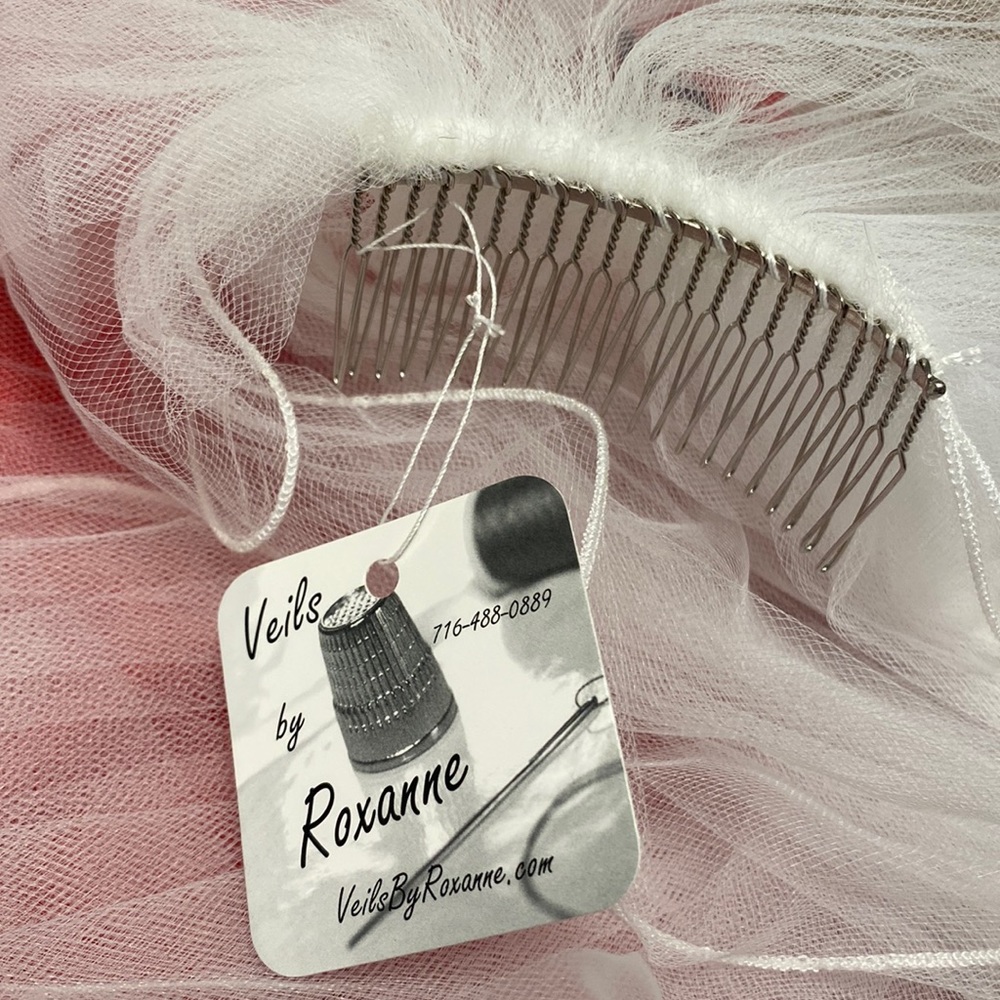 Cathedral length veil with lettuce edge and blusher